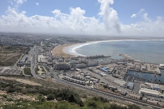 Agadir's curved bay, port and beachfront seen from the kasbah hill